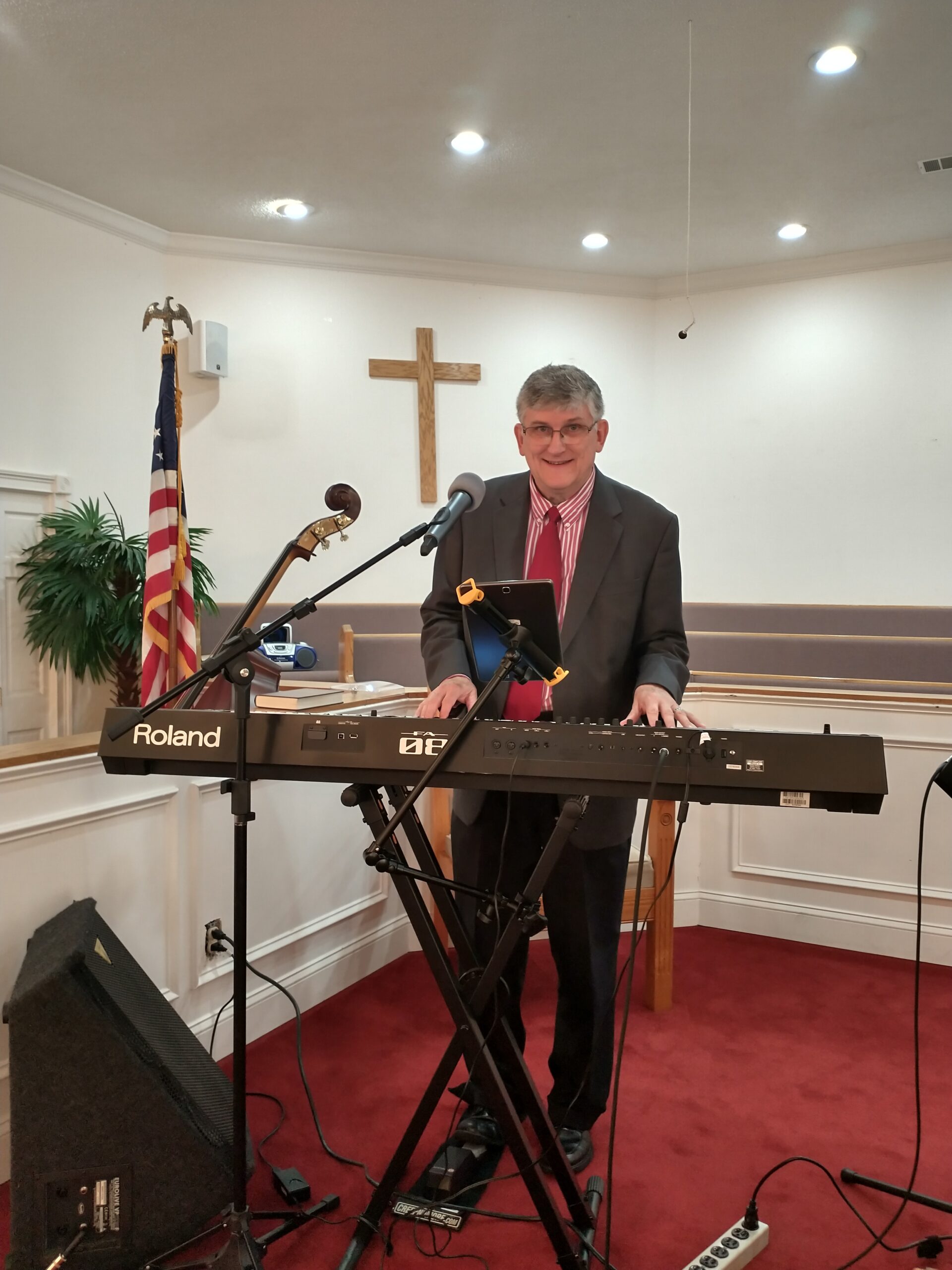 Richard leading a Senior Adult program from his keyboard